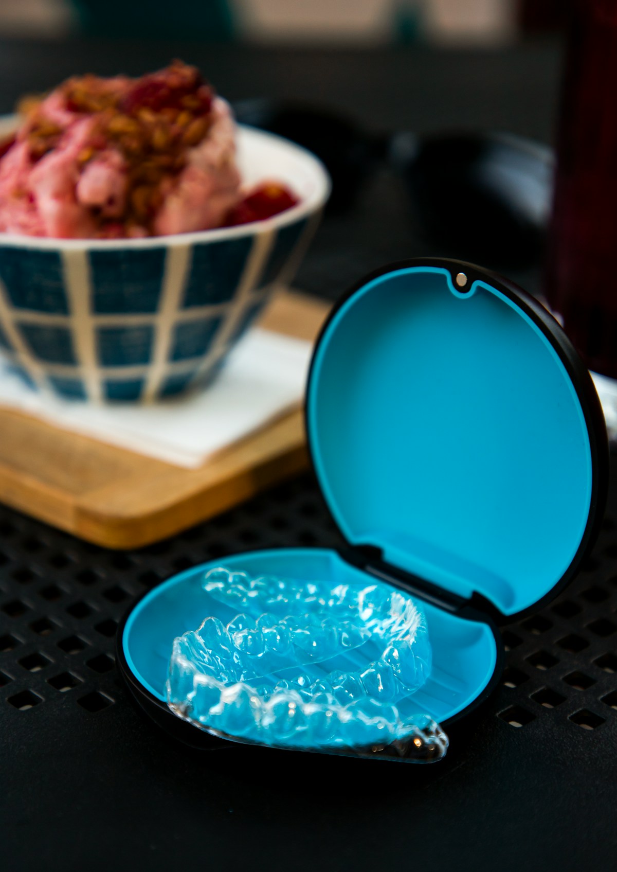 Clear dental aligners in a protective case